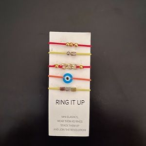 Never worn, By Lilla 5 elastic ring set.